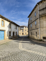 Quiet cobblestone street in Olleros de Paredes Rubias, Palencia