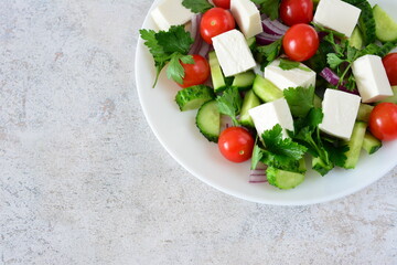 Fresh and Healthy Salad with Feta Cheese and Vegetables copy space