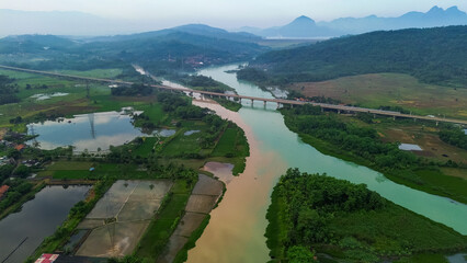 Naklejka premium Drone View of Citarum River at Jatiluhur Dam, Purwakarta – Stunning Aerial Landscape