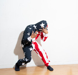 Man poses in American flag