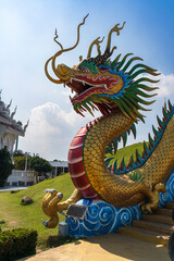 Fototapeta premium Male Dragon at the Giant Lady Buddha Guanyin The Goddess of Mercy - Wat Huay Kang