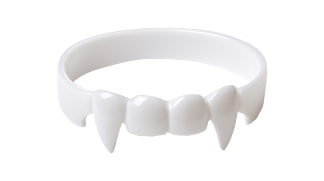 White plastic vampire fangs for a Halloween costume accessory