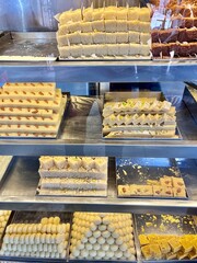Display of Assorted Indian Mawa Sweets in a Shop – Traditional Milk-Based Desserts