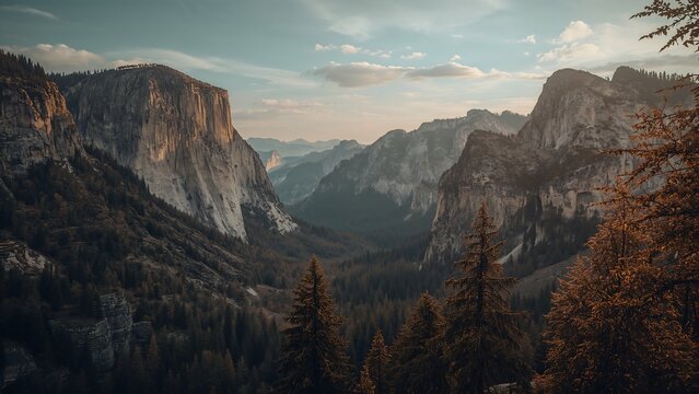 Photo of panoramic view of yosemite valley national park with its granite cliffs and evergreen forests in the golden light of sunset