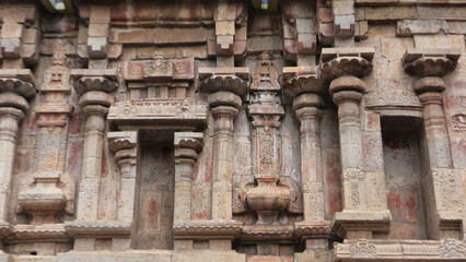 Closeup of carved stone walls at Kasi Viswanathar Temple, Kumbakonam, Tamil Nadu, India
