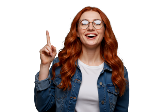 Cheerful caucasian woman with ginger hair pointing up, having a moment of inspiration and a great idea.