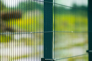 3d metal mesh on green background