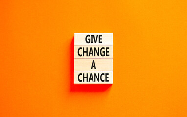 Give change a chance symbol. Concept words phrase Give change a chance on beautiful wooden blocks....