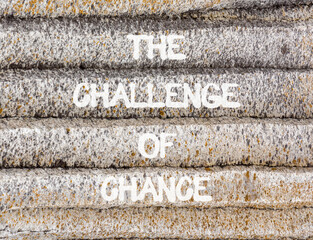 The challenge of chance symbol. Concept words phrase The challenge of chance on beautiful grey stone wall. Beautiful stone wall background. Business The challenge of chance concept. Copy space.