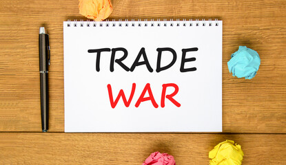 Trade war symbol. Concept word Trade war on beautiful white note. Black pen, colored paper....