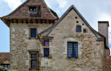 Historic stone houses in the village of Carennac in the region Perigord, France;
