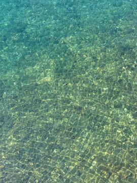 Sea water clear surface aqua background.