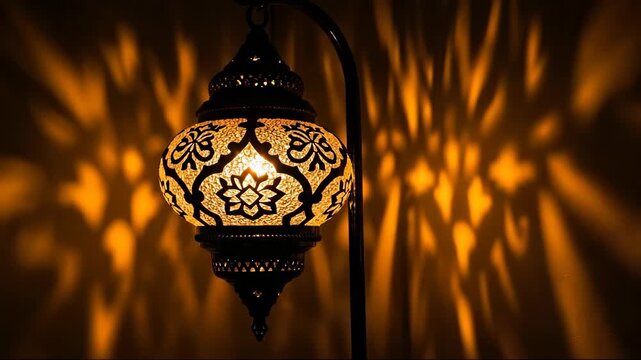 Traditional moroccan lantern ornate patterns casting shadow lights warm background. Arabian decor ambient lighting concept. Interior design lighting decoration services banner