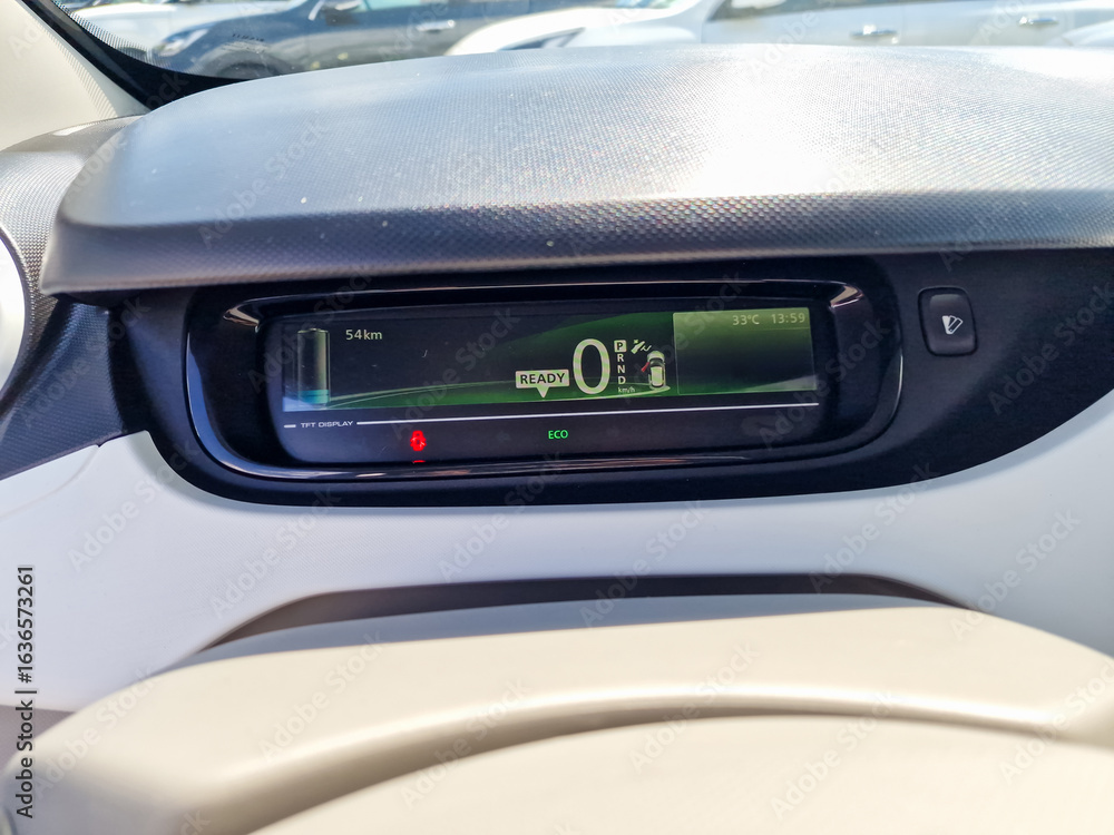 Poster a vehicles dashboard features a modern design displaying key information like energy consumption and