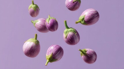 Floating Baby Eggplants in Air on Soft Purple Background