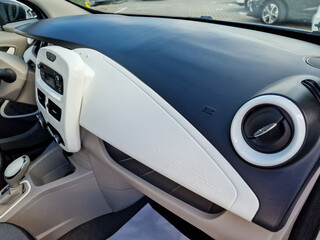 The interior dashboard design of a modern vehicle showcases a stylish and contemporary look,...