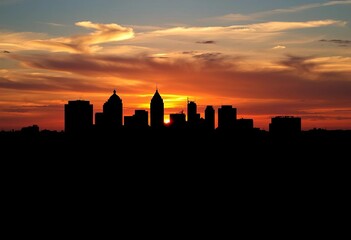 San Antonio skyline silhouette at sunset, dramatic shadows,  cityscape,  golden hour
