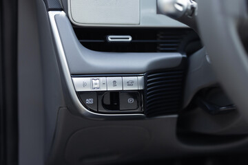 Auto hold button in a modern vehicle. ESP electronic stability program control. Interior detail of...