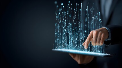 A person interacts with a digital tablet displaying data streams.