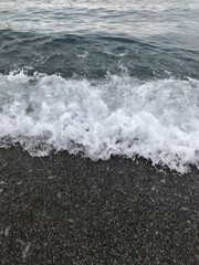 Morning waves sparkling in the Mediterranean sunlight.
