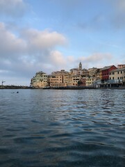 Seaside rocks glowing under the rising sun.
