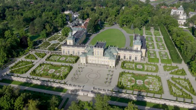 Wilanow Royal Palace of king Jan III Sobieski with surrounding garden and park with Wilanow district and metropolitan panoramic view of downtown Warsaw in Poland