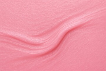 Fototapeta premium A soft, pink fabric with a subtle texture, creating a gentle wave pattern