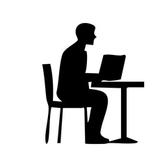 silhouette of a man working on a laptop