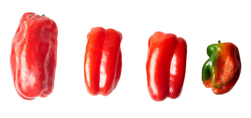 Set of four red bell peppers in varied imperfect shapes, isolated on white background. Ugly produce concept promoting sustainability food waste reduction and acceptance of natural diversity.

