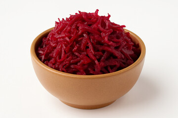 Fototapeta premium Grated beetroot in ceramic bowl isolated on white stock photo 