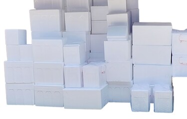 Stacked white rectangular and cube insulated polystyrene foam boxes insulated boxes