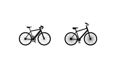 Obraz premium Two black bicycles side by side on a white background