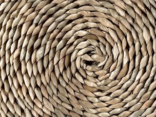 Round wicker braided coaster close-up