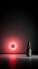 Fototapeta premium Black Bottle with Red Glowing Ring Minimal Product Photography