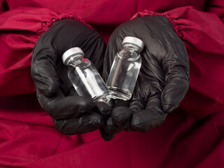 Doctor, nurse, and female scientist holding a blank vial on an isolated background. Blank medical...