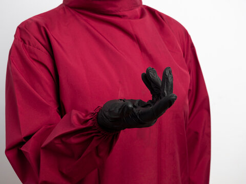 Close-up of a doctor, nurse, and female scientist holding a blank vial gesture on an isolated background. Blank medical vial mockup concept for pharmaceutical, vitamin, and research companies.