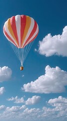 Fototapeta premium Brightly Colored Paraglider Canopy Soaring Above Fluffy White Clouds