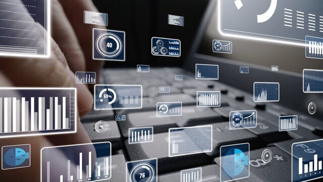 A close-up view of hands typing on a keyboard with floating digital graphics showing data analysis, statistics, and metrics to illustrate modern technology and workspace dynamics. Xenic