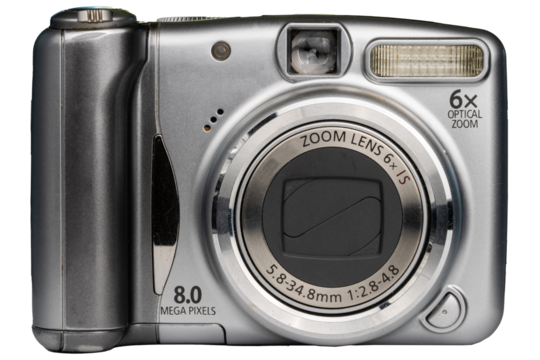 Old digital point and shoot camera. Digital camera isolated. Pocket camera