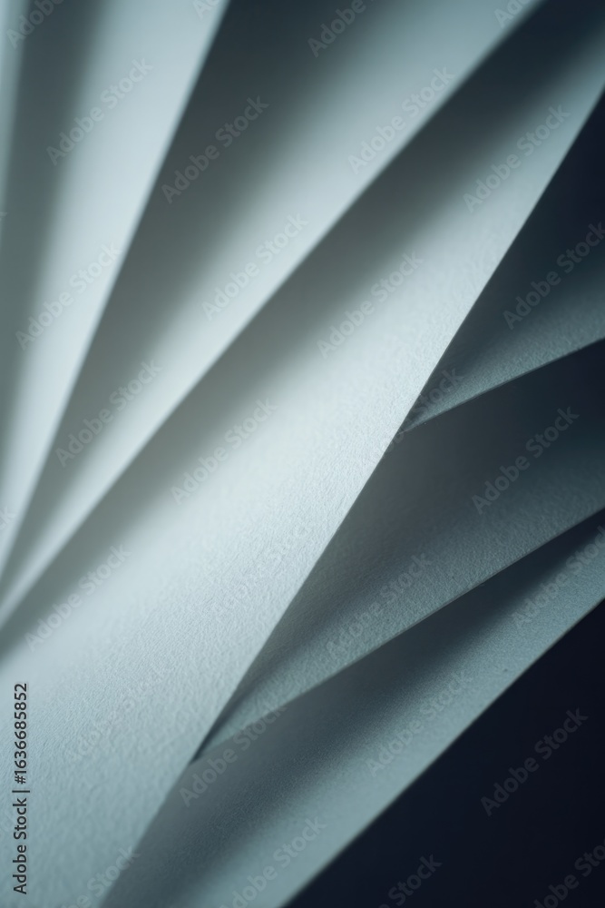 Poster soft folds of paper create dynamic interplay of light and shadow