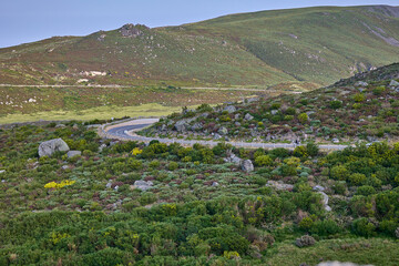 Serpentine road through rocky hills