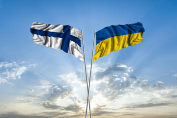 Waving National flag of Ukraine and flag of Finland for international unity