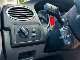 Comprehensive and Detailed View of Car Dashboard Controls Highlighting the Air Vent as well as the...