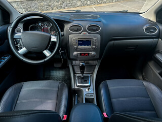 The modern automobile boasts an interior characterized by a sleek and stylish design, complemented...