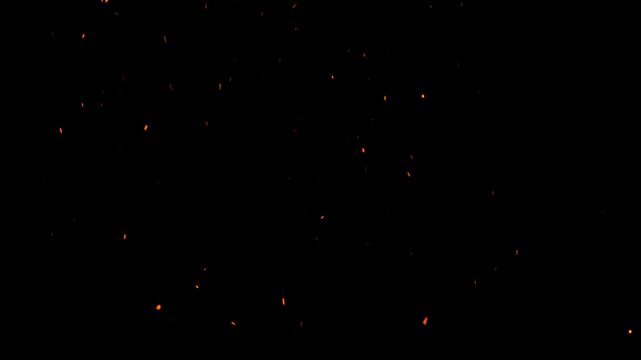 Fire sparks flying particles on transparent background video, alpha channel. 4k Flying Embers and Sparks from a Fire. 4K overlay fire sparkles, Dancing bonfire embers, fire sparks effect