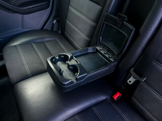 This is a Stylish and Highly Functional Car Interior Armrest that comes with builtin Cup Holders designed to enhance Comfort and Convenience for all passengers during their travels
