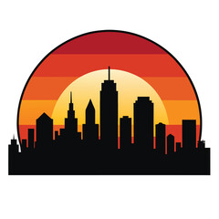 Obraz premium Modern city skyline silhouette at sunset with vibrant orange and purple hues urban landscape