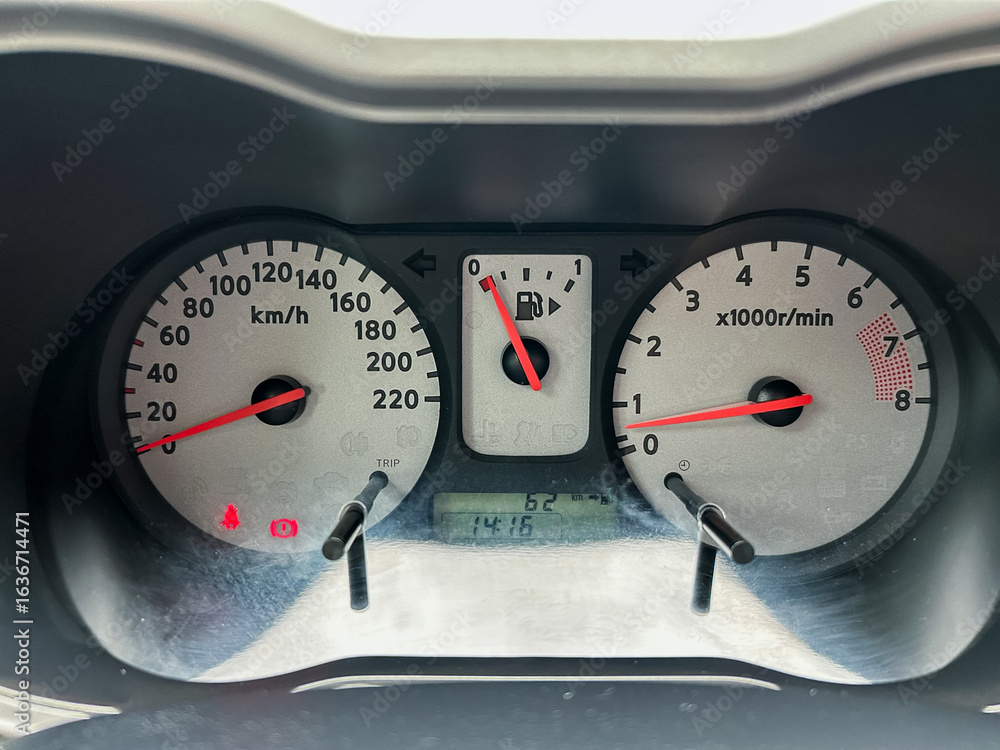 Poster the cars dashboard instrument cluster is efficiently displaying the speedometer, tachometer, and fue