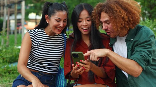 Friends sharing laughter and enjoying social media together