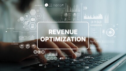 Hands Typing on Keyboard with Revenue Optimization Graphics and Digital Data Overlays in Office Environment. Asymptotic smart data analytic.